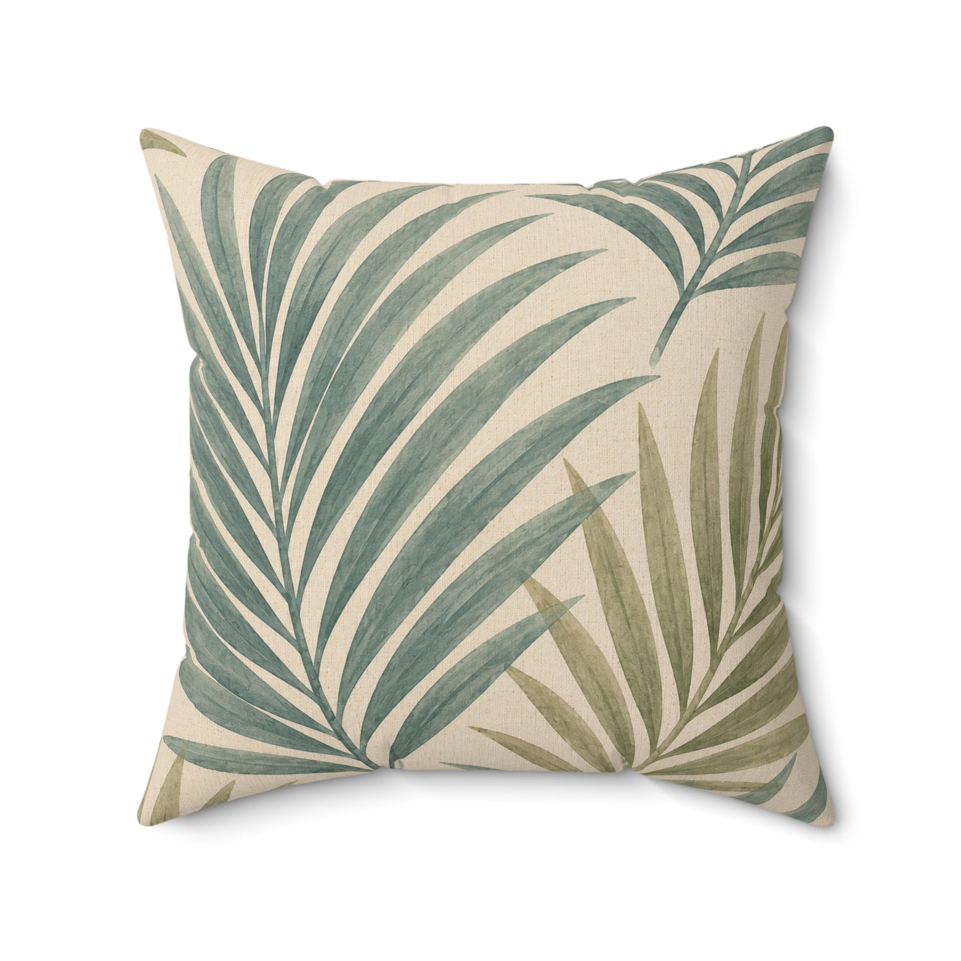 Decorative pillow with green leaf pattern on a beige background