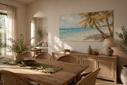 Dining room with wooden table and chairs, large painting of a beach scene on the wall.