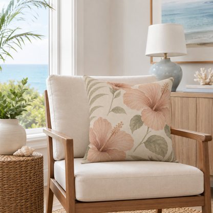 Chair with floral pillow in a room with a lamp and plants